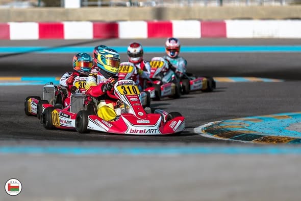 Karl Saad leading a kart race during championship competition